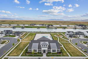 Aerial view featuring a water and mountain view and a residential view