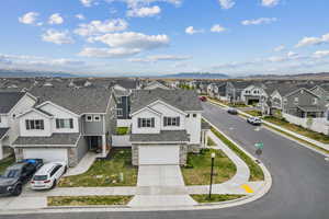 Drone / aerial view with a residential view and a mountain view