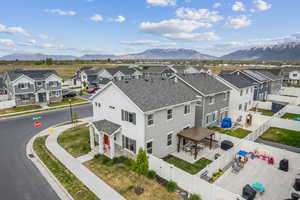 Drone / aerial view featuring a residential view and a mountain view