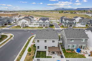 Drone / aerial view with a residential view and a mountain view