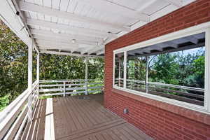 Deck with view of scattered trees