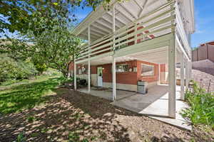 View of patio featuring a deck and cooling unit