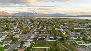 Birds eye view of property featuring a residential view and a mountain view