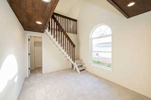 Interior space with recessed lighting, baseboards, and carpet
