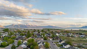 Drone / aerial view featuring a residential view and a mountain view