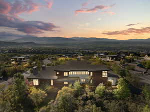 View of subject property featuring mountains