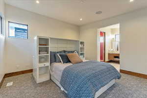 Bedroom with recessed lighting, carpet flooring, visible vents, and baseboards