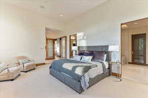 Bedroom featuring carpet floors, baseboards, recessed lighting, and tile patterned flooring
