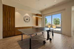 Playroom featuring light wood finished floors and recessed lighting