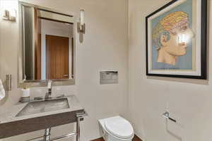 Bathroom with a sink and toilet
