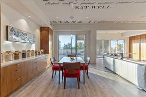 Dining room featuring recessed lighting and light wood-style floors