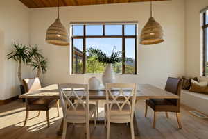 Dining room featuring hardwood / wood-style floors and baseboards