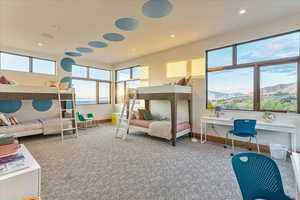 Bedroom with carpet flooring, baseboards, and recessed lighting