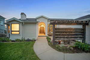 Front of the home with courtyard