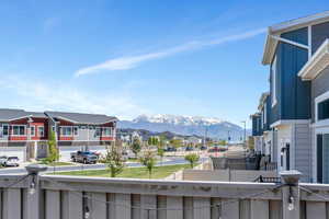 Balcony with a residential view and a mountain view