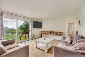 Living room with light wood finished floors