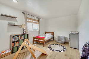 Bedroom featuring wood finished floors