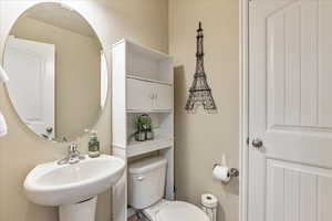 Bathroom with a sink and toilet