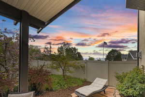 View of patio with fence