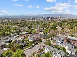 Birds eye view of property featuring a mountain view