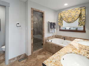 Primary bathroom with steam and rain  shower head.