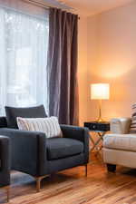 Sitting room with wood finished floors