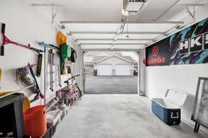 Garage featuring a garage door opener