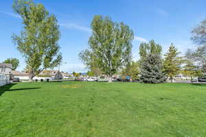 View of yard featuring fence