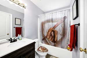 Full Bathroom with toilet, shower / bathtub combination