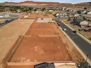Birds eye view of property with a residential view and a mountain view
