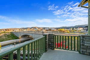Balcony with a residential view and a mountain view