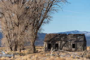 View of outbuilding featuring a mountain view