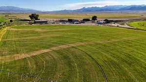 Aerial view of sparsely populated area with a mountainous background