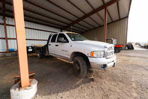 Garage featuring metal wall