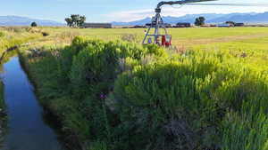 View of yard featuring a view of countryside and a mountain view