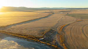 Drone / aerial view with a mountain view and a rural view