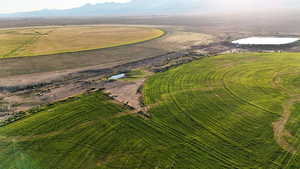 Aerial view of sparsely populated area featuring a mountainous background