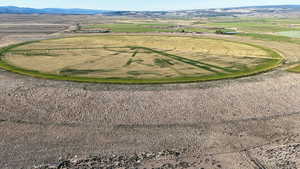 Aerial view of sparsely populated area featuring a mountainous background
