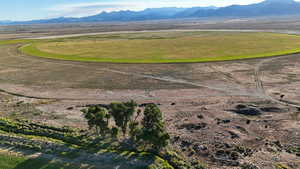 Aerial view of property's location featuring mountains and rural landscape
