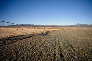 Property view of mountains featuring a rural view