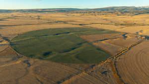 Aerial view featuring a rural view and a mountain view