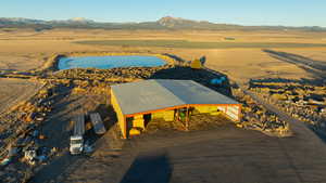 Bird's eye view with a rural view and a water and mountain view
