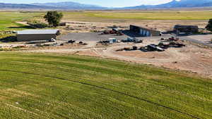 Overview of rural landscape featuring a mountainous background