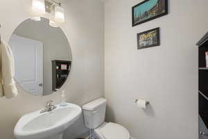 Bathroom with a sink and toilet