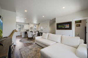 Living area featuring recessed lighting and wood finished floors