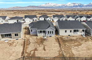 Aerial view featuring a residential view and a mountain view