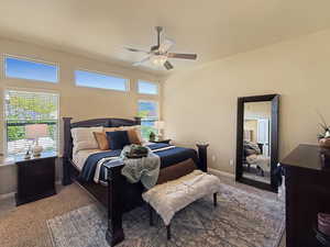 Spacious primary suite with large windows, natural light, and breathtaking views of the mountains.