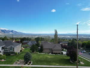 Spacious corner lot with stunning views of the valley and mountains from every angle.