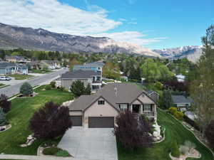 Beautiful home on a large lot with surrounding views of the mountains and valley.