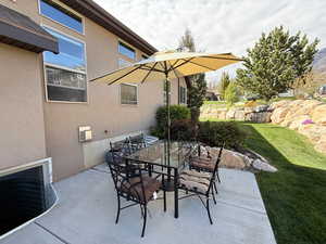 Perfect patio space for shade and outdoor dining while enjoying the views of the mountains.